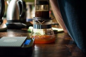 Pressing coffee through an AeroPress 